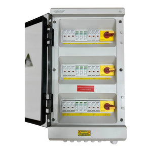 Voltacon IP65 solar PV combiner box with open door showing three rows of circuit breakers and yellow disconnect switches with