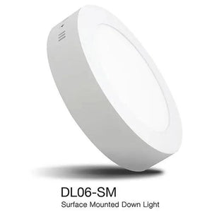 White circular LED surface mounted down light, model DL06-SM, shown at an angle against white background.
