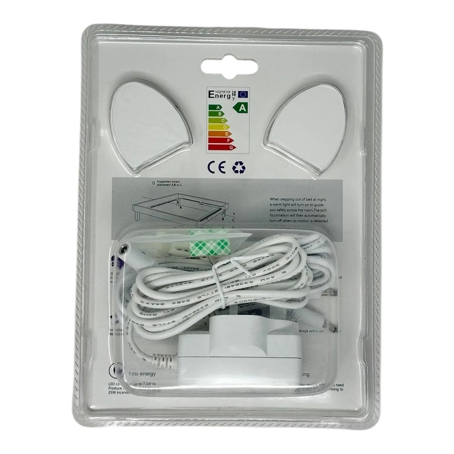 Packaged LED motion sensor strip light kit with two sensor heads, coiled white cable, and controller module on clear blister 