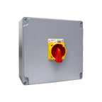 Gray metal electrical enclosure with yellow and red rotary disconnect switch mounted on front panel, product shot against whi