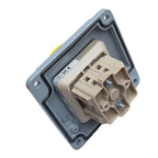 Fire-rated AC switch disconnector shown disassembled, displaying gray outer casing, beige internal switching mechanism, and t