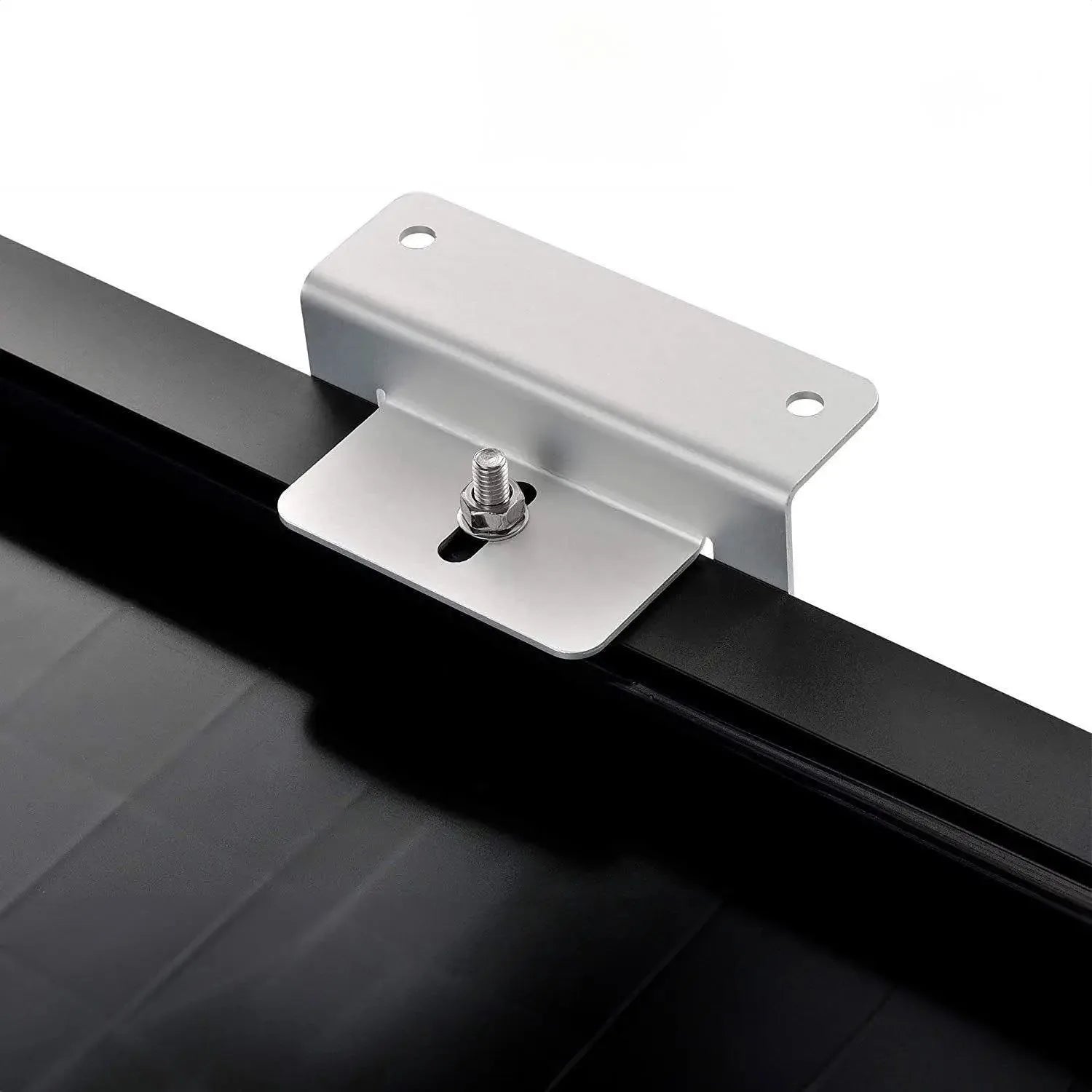 Silver aluminum Z-bracket with mounting holes and stainless steel bolt, installed on black rail for solar panel mounting.
