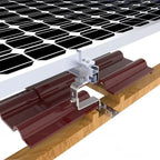 Solar panel roof mounting kit with burgundy rails and metal clamps installed on wooden tile roof substrate