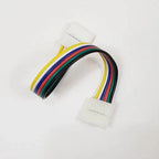 Multicolored ribbon cable with white PCB connectors at each end, featuring yellow, blue, red, green, and black wires against 