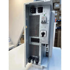 Voltasol ESS 5500W Hybrid Inverter Charger mounted on wall showing AC breaker, PV switch, DC breaker controls and ventilation