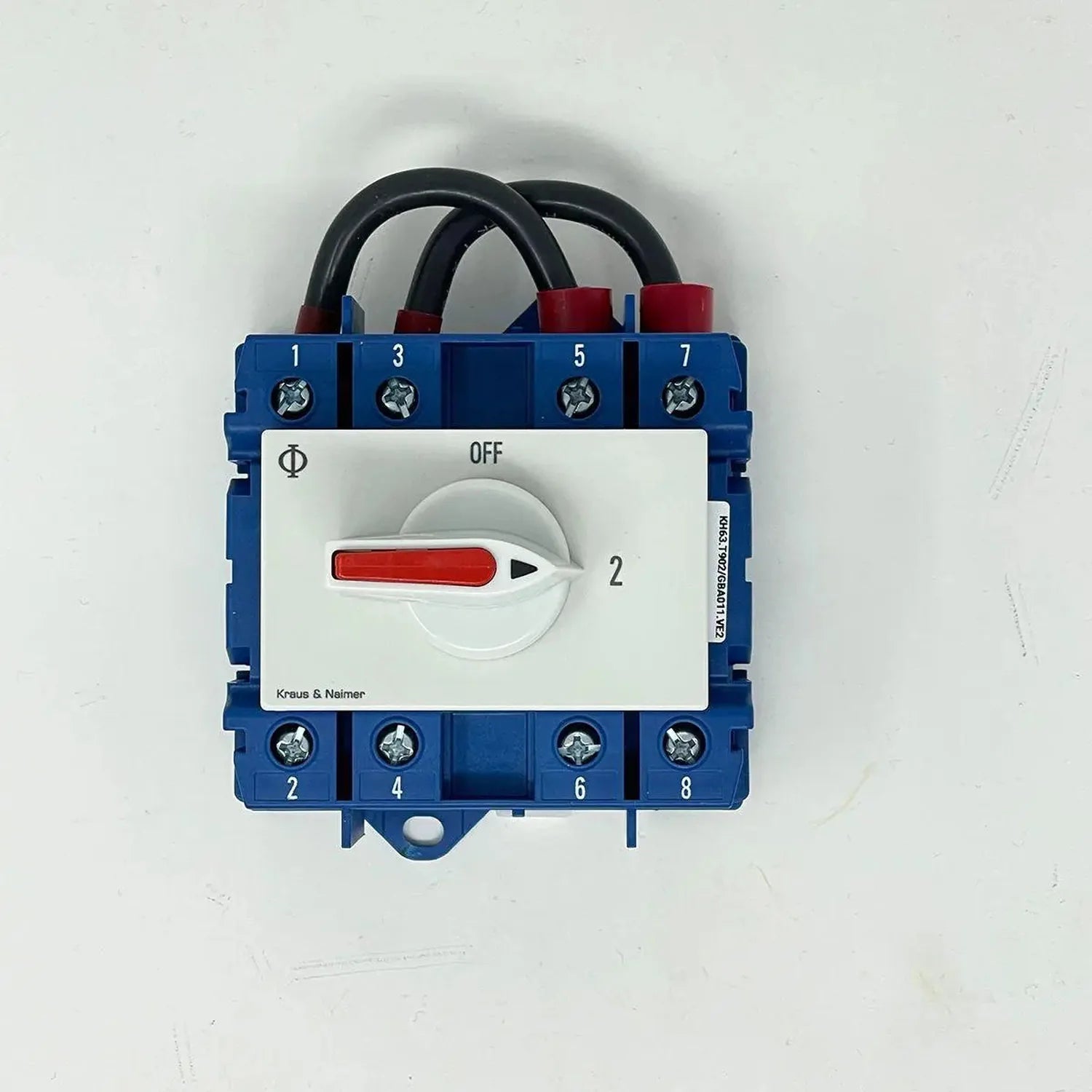Blue manual changeover switch with red handle lever marked OFF and position 2, featuring numbered terminal connections 1-8 an