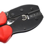 Red and black MC4 solar cable crimping tool with adjustable die set and ergonomic handles, product shot on white background.