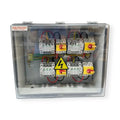 Voltacon PV Combiner Box with four input and four output channels, featuring white circuit breakers, yellow disconnect switch