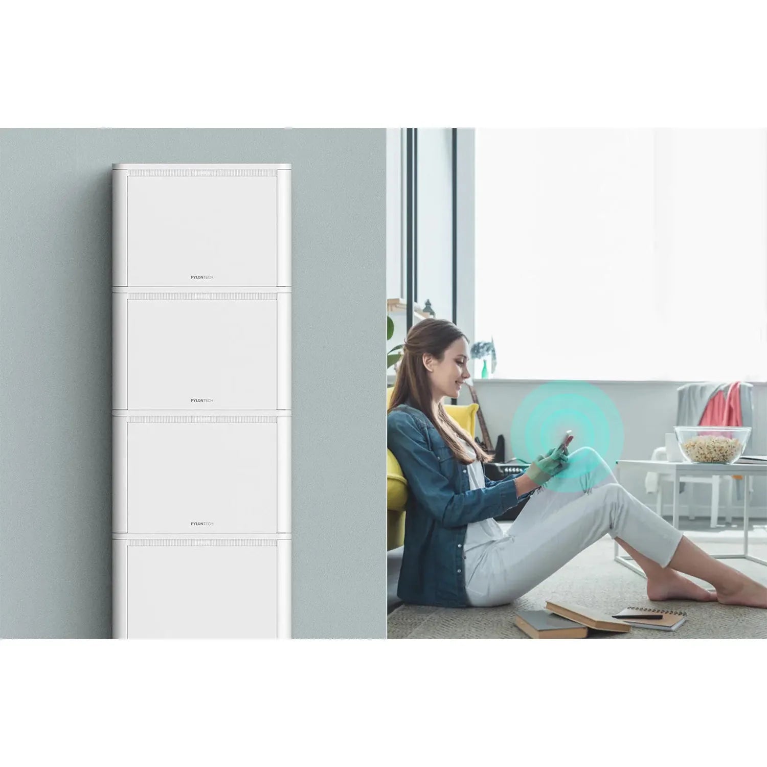 Pylontech Pelio-L battery mounted on wall next to woman using tablet indoors.