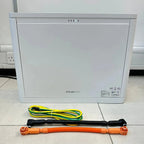 Pylontech Pelio-L battery unit displayed with three colored cable connectors on white tile floor.