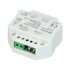 White smart light switch module with green terminal connectors, control button, and technical specifications printed on housi