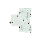 White DC isolator switch with brass terminals, front and back view showing technical specifications and certification marking