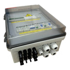 Solar PV combiner box with clear polycarbonate cover showing internal circuit breakers and components, four black cable conne