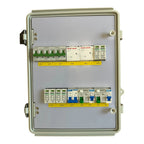 Open electrical enclosure showing circuit breakers, surge protectors, and terminal blocks mounted on DIN rail inside beige we