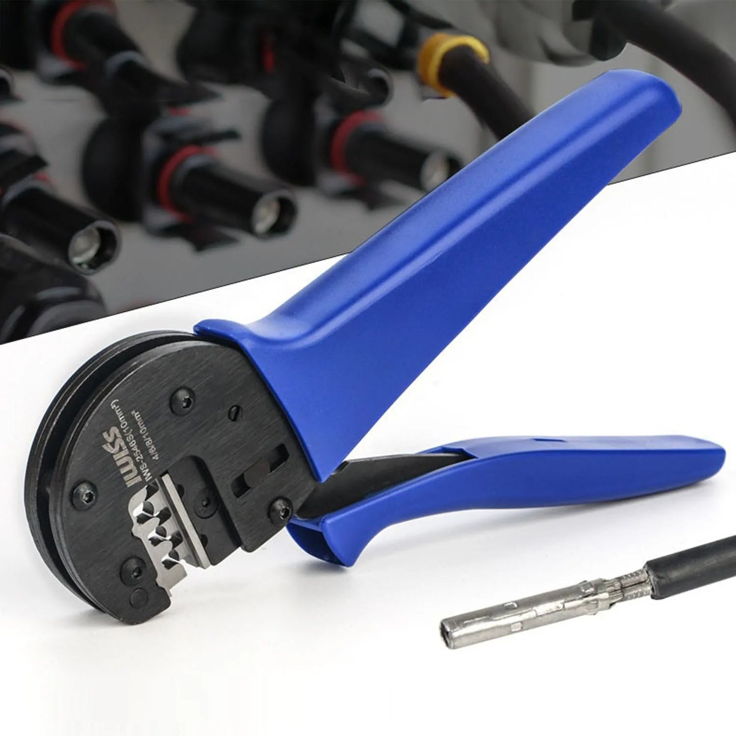 Blue-handled MC4 crimping tool with black metal head, displayed with a bare wire terminal on white background.