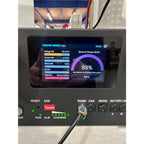 FogStar Energy battery management display screen showing 53.34V voltage, 89% state of charge, and 14W power output with syste