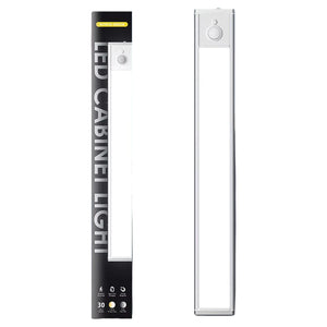 Ledison under cabinet light packaging and product display showing black box with white light fixture and motion sensor button