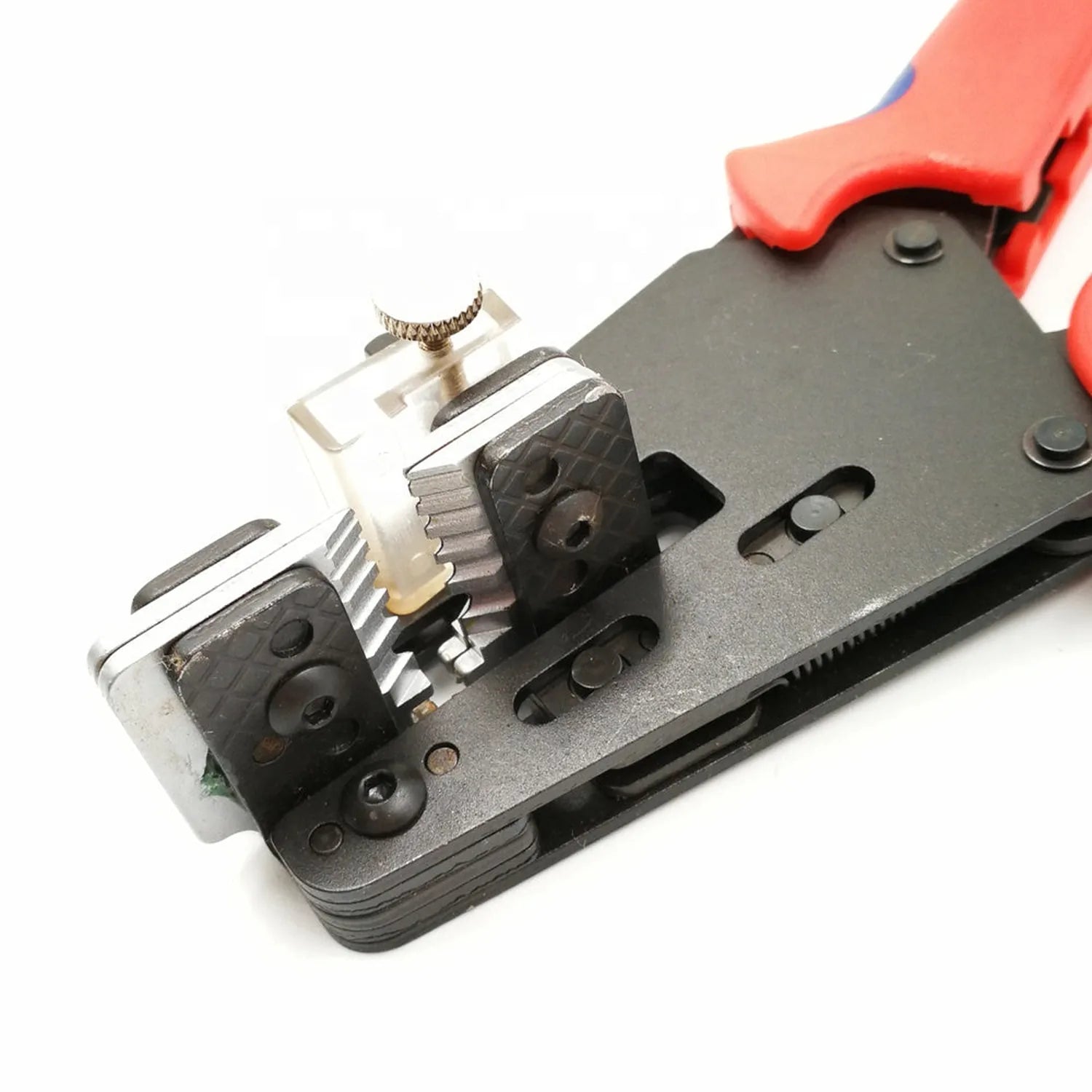 Precision cable stripping tool with red handle showing exposed metal cutting mechanism and black polymer body with multiple a