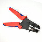 Precision cable stripping tool with red and blue ergonomic handles and black metal head, displayed against white background.