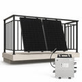 JA Solar balcony mounting system with two black solar panels and white micro inverter unit, installation shot.