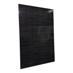 Black monocrystalline solar panel tilted at an angle against white background, showing gridded cell pattern and frame.