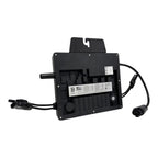 Black microinverter with cable connectors and specification label, rear view showing power connections and mounting hardware.
