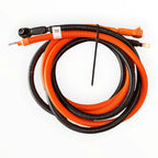 Coiled orange and black corrugated battery extension cable with connectors displayed on white background, product alone view.