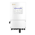 Solis white hybrid inverter with touchscreen display showing system diagram, mounted on wall with cable connections at bottom
