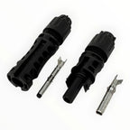 MC4-Evo 2 solar connectors disassembled showing two black male and female housing units with metal pins and terminals.