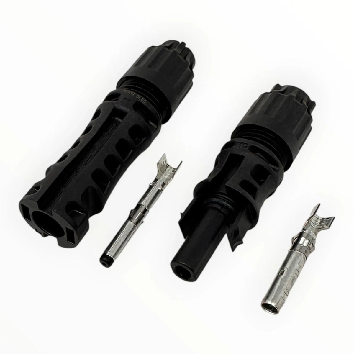 MC4-Evo 2 solar connectors disassembled showing two black male and female housing units with metal pins and terminals.