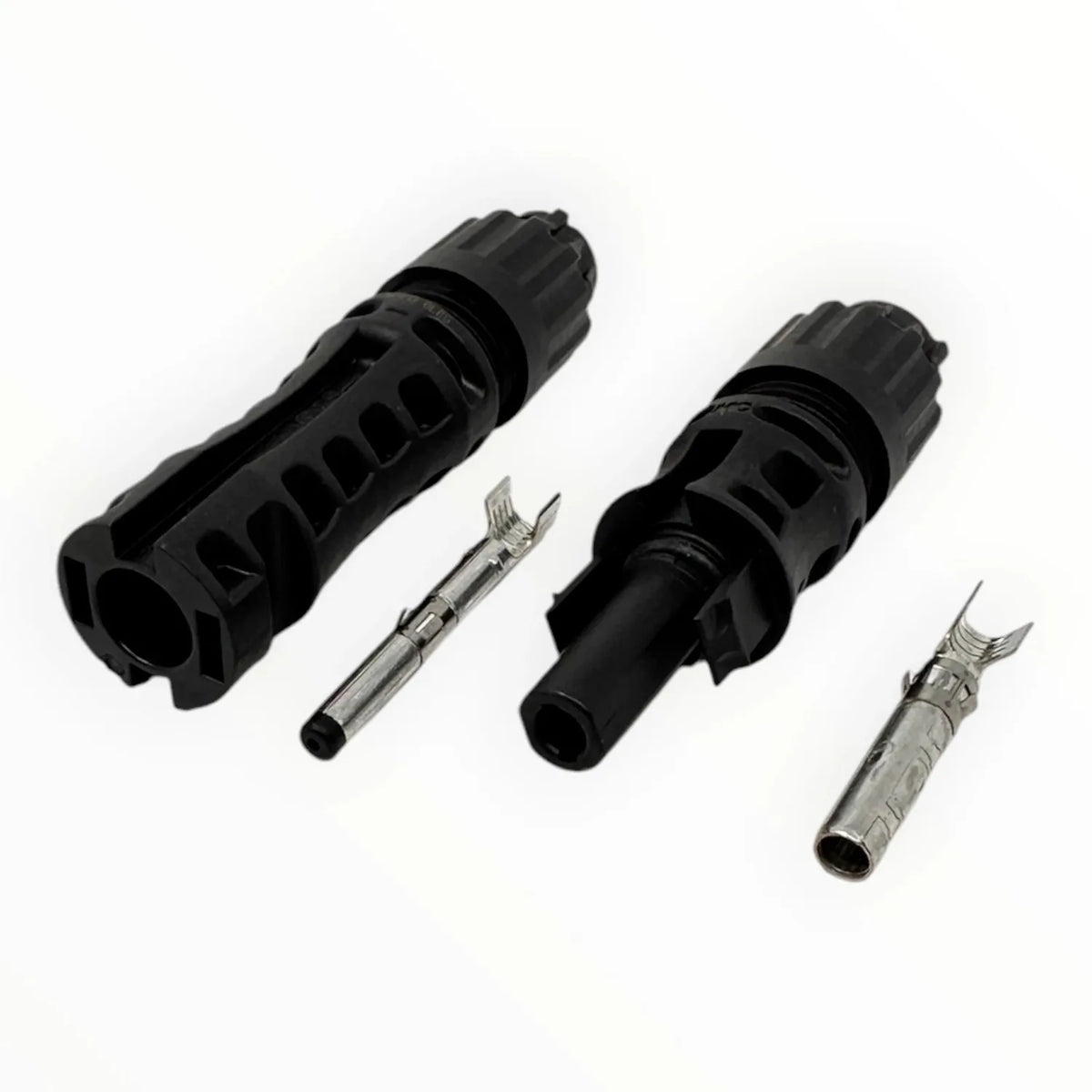 MC4-Evo 2 solar connector pair disassembled, showing two black housing shells, two metal pin contacts, and internal component