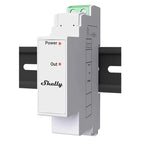 Shelly Pro 3EM relay module mounted on DIN rail with white control panel showing Power and Out indicator lights.