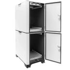 White stacked battery cabinet with two open doors showing black interior compartments and metal shelving.