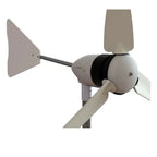White and beige 1kW wind turbine with three blades, black motor housing, mounting pole, and directional vane assembly, produc