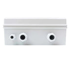 Top-down view of white rectangular electrical enclosure with three white connector ports with black openings mounted on front