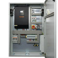 Voltagon power conversion cabinet interior showing black inverter unit, circuit breakers, wiring terminals, and safety discon