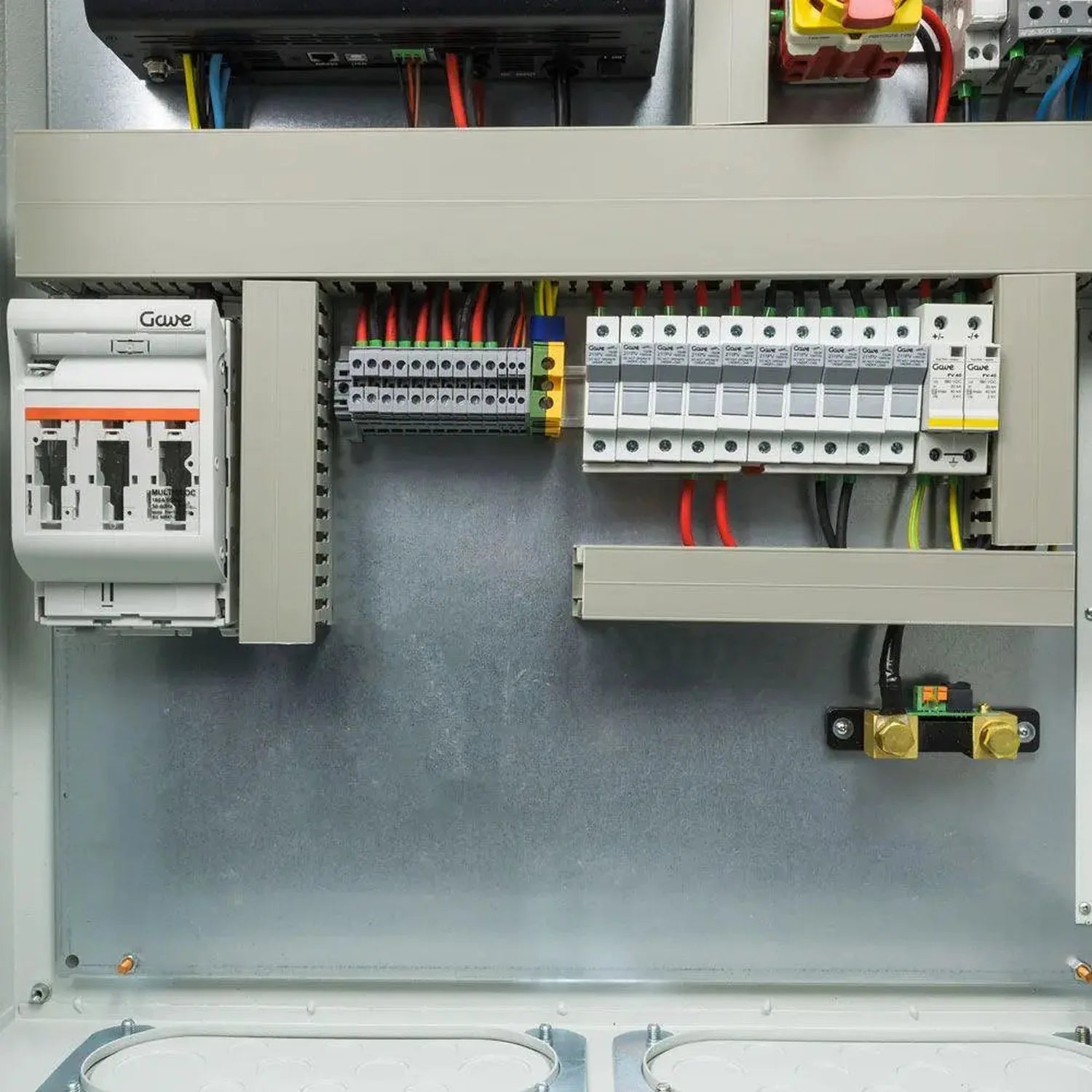 Open electrical cabinet showing 48V inverter charger system with circuit breakers, terminal blocks, and wiring installation.