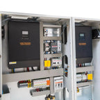 Voltagon power conversion cabinet with inverter, circuit breakers, and wiring installation shot showing internal components a