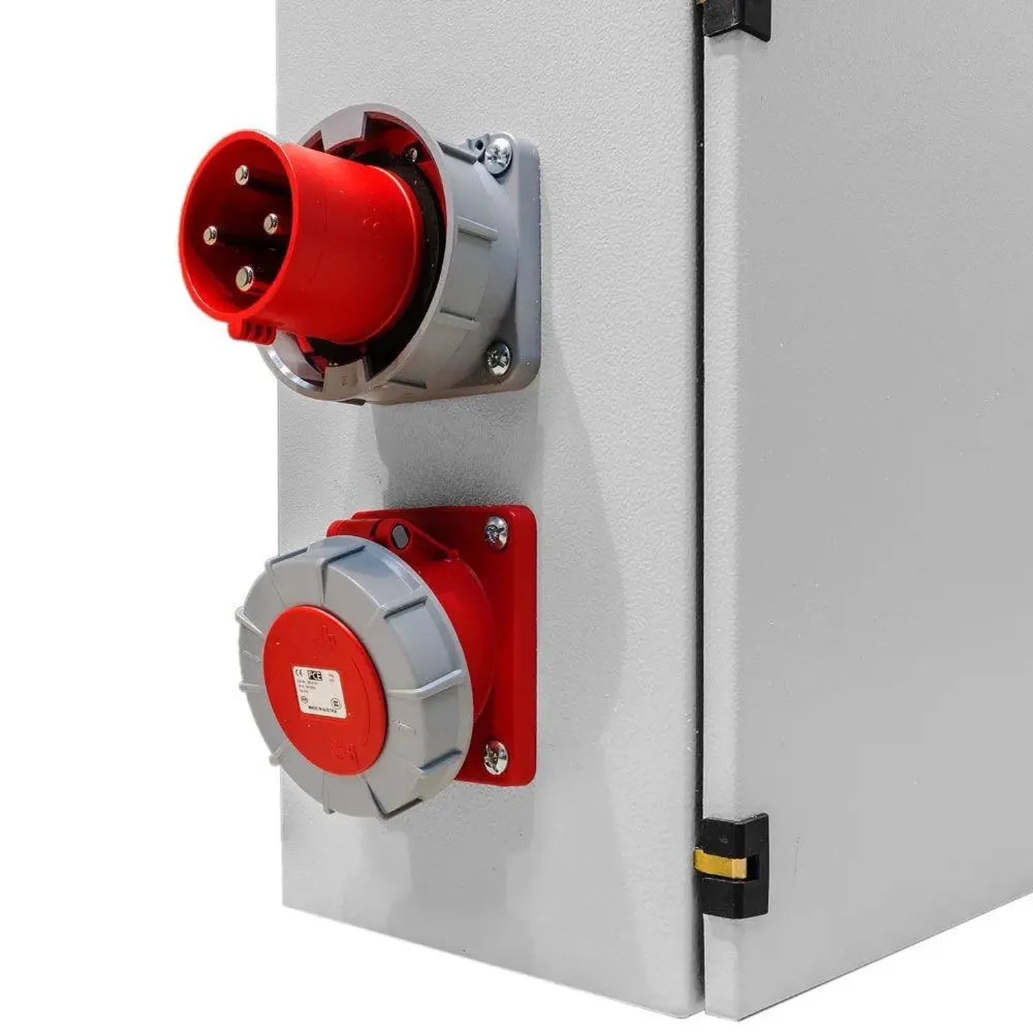 Red and gray industrial electrical outlet panel mounted on white wall with two receptacles and safety covers.