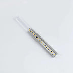 Aluminium LED profile with integrated diffuser strip showing yellow LED diodes mounted on silver metal channel, displayed aga