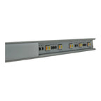 Aluminium LED profile strip with integrated warm white and amber LED modules mounted in grey anodized channel housing.