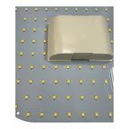 Cream-colored LED 2D lamp positioned on a gray circuit board dotted with yellow surface-mount LEDs, showing the product and i