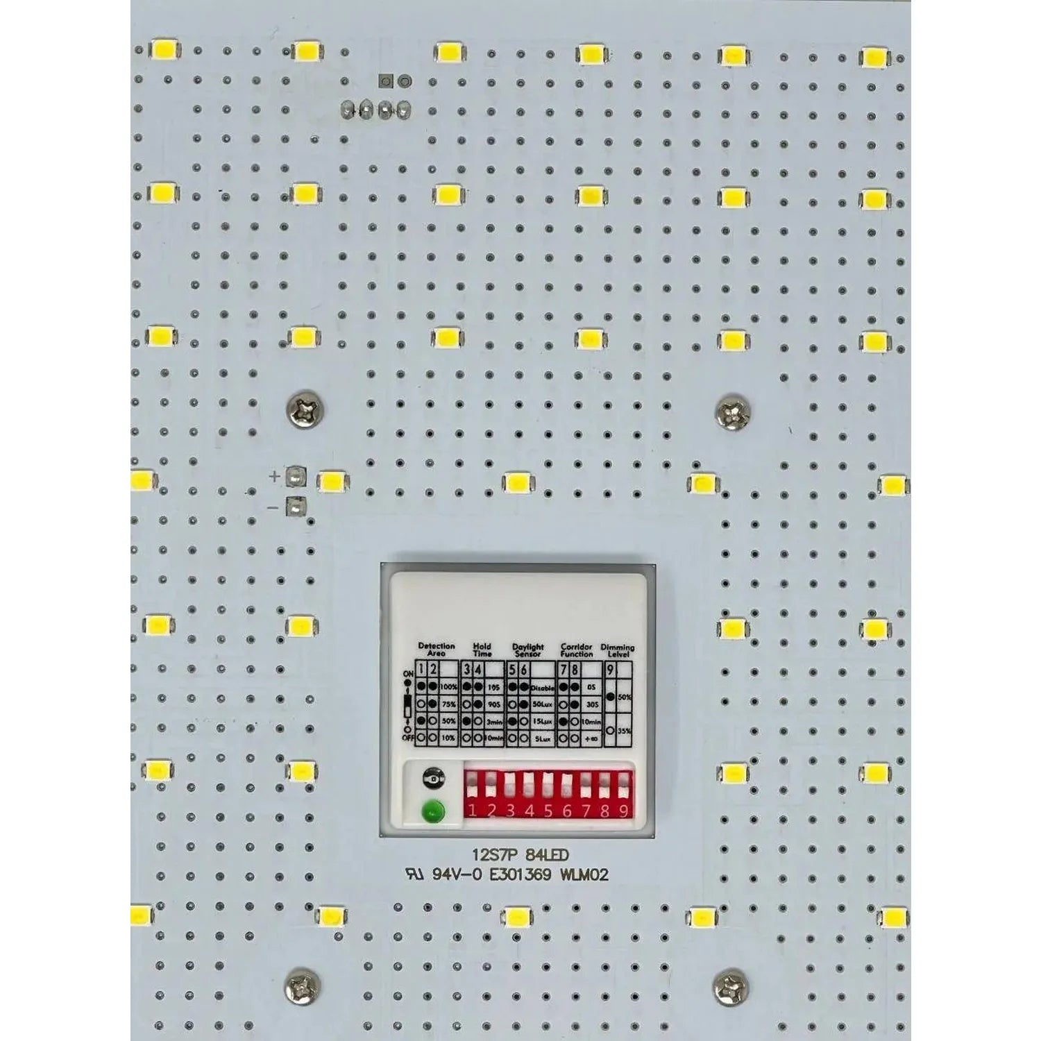 LED panel with yellow square lights arranged in grid pattern, central control module with dip switches and green power indica