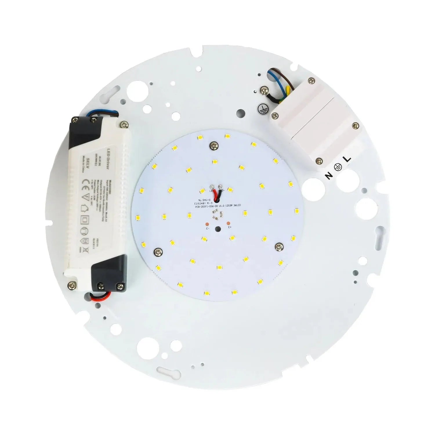 Circular LED module viewed from reverse side showing yellow SMD LEDs, white driver unit, wiring, and mounting holes.