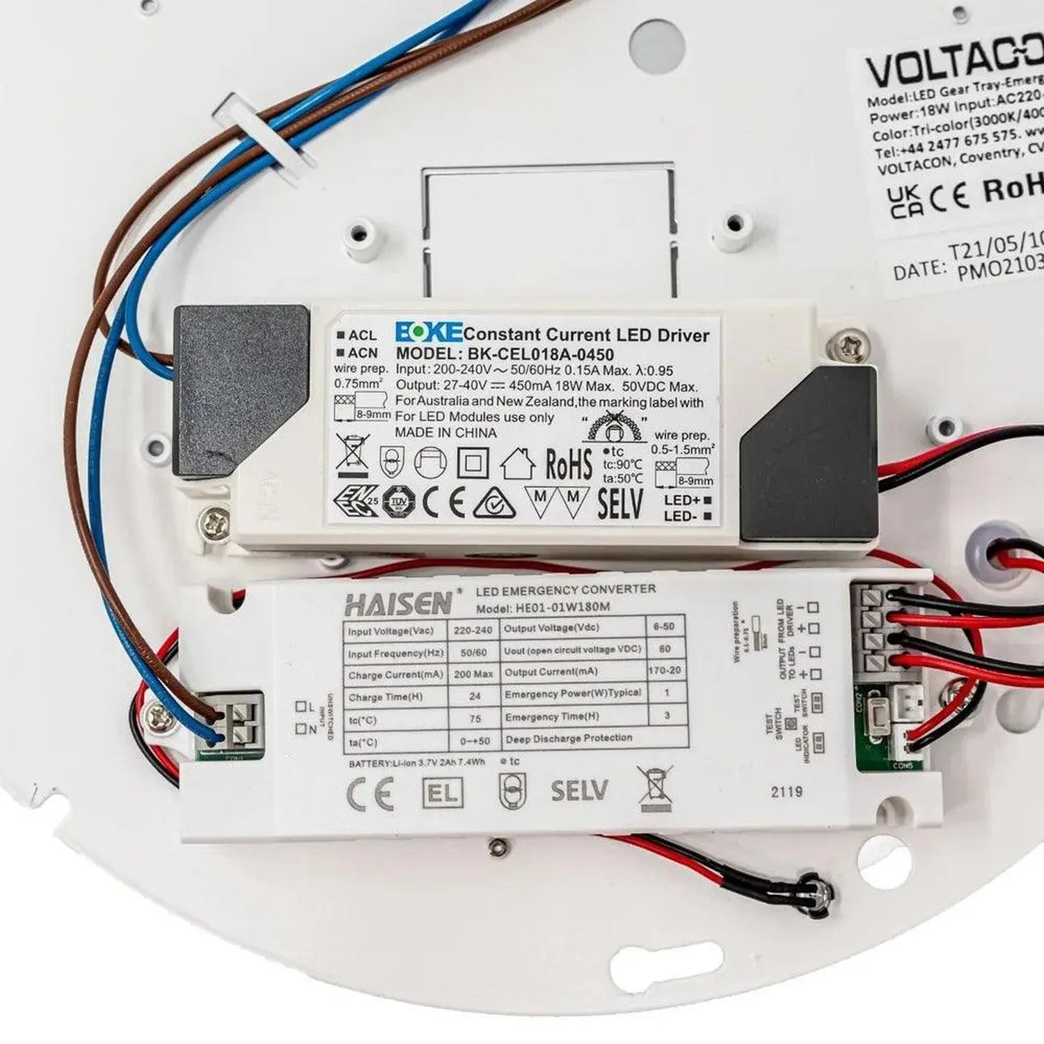 Internal components of LED gear tray light showing constant current driver, emergency converter, wiring, and circuit board.