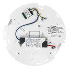 Underside view of circular LED fixture showing wiring, constant current driver, and terminal block connections on white base 