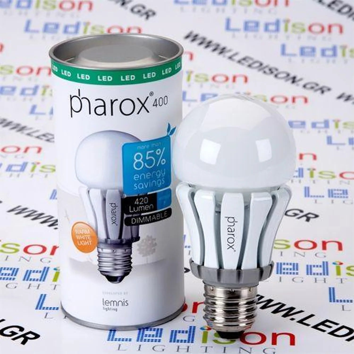 Pharox 400 LED bulb next to its packaging, showing dimmable warm white bulb with 85% energy savings claim.