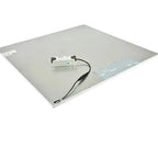 Rear view of square LED panel light showing white driver unit with black cable attached to aluminum backing plate.