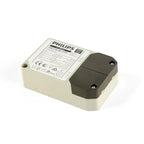 Philips LED driver unit with cream housing, black connector block, and technical specifications label visible on top.