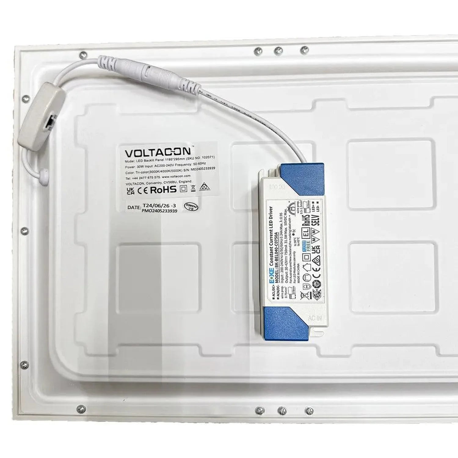 Rear view of LED panel light showing Voltacon label and integrated LED driver with blue accents, mounted in white housing wit